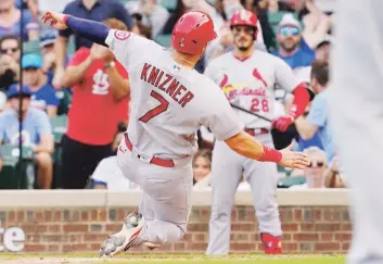  ?? AP ?? 16 EN LÍNEA. Los Cardinals de San Luis lograron ayer su 16ta victoria corrida para solidifica­r su puesto como segundo comodín de la Liga Nacional.