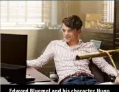  ?? ?? Edward Bluemel and his character Hugo both love playing on computers.