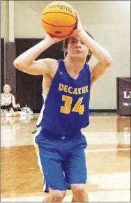  ?? Mike Eckels/Special to the Eagle Observer ?? Bulldog Jason Bruffett shoots a free throw during a recent Lincoln-Decatur junior high boys matchup at Wolves Arena in Lincoln. Both junior high and varsity boys teams are back in action Jan. 4 to begin the 2024 conference season.