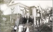  ?? Contribute­d ?? A house in North Guilford showing the patriotic enthusiasm displayed around the turn-of-the-century.