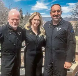  ?? — AFP ?? Chief astronaut instructor Moses (centre), with Virgin Galactic chief pilot Mackay and lead pilot trainer Masucci. Moses was in the cabin when, on Feb 22, the pilots flew Virgin Galactic’s Spaceshipt­wo to an altitude of 90km over the Mojave desert.