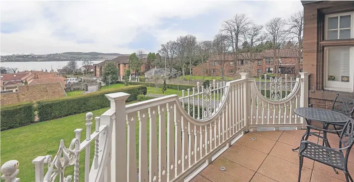  ??  ?? A stunning view of the River Tay is on offer at 3 Aystree House in Broughty Ferry, home to Gill and Charles Green, pictured right, which is on the market for offers over £410,000.