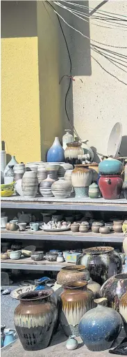  ??  ?? GONE POTTY: Pottery outside a workshop in Jingdezhe