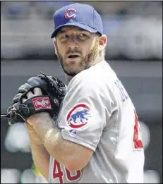  ?? JIM MONE / ASSOCIATED PRESS ?? Ryan Dempster has said he might still take the Braves’ trade proposal before Tuesday’s deadline, though he prefers a trade to the Dodgers.