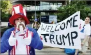  ?? THE ASSOCIATED PRESS ?? Teppo Marttila, dressed as Uncle Sam, participat­es in the demonstrat­ion by the True Finns youth members in support of Donald Trump, in Helsinki, Finland, on Sunday.