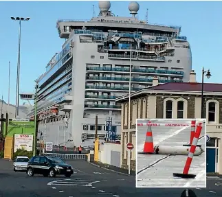  ?? PHOTOS: HAMISH MCNEILLY/FAIRFAX NZ ?? The Emerald Princess towers over the wharf at Port Chalmers in Dunedin. A crew member died on the ship on Thursday evening following a gas canister explosion. Inset: An exploded gas cylinder on the wharf.
