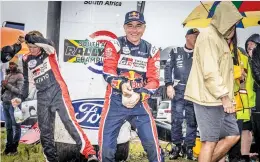  ?? Picture: Andre Viljoen ?? POP AND FIZZ. Giniel de Villiers celebrates after finishing second at the Parys 400 with navigator Rodney Burke to be crowned 2022 South African Rally-Raid champion.