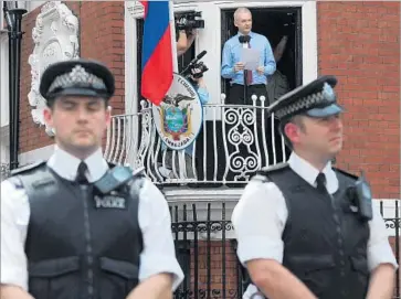  ?? Carl Court AFP/Getty Images ?? WIKILEAKS founder Julian Assange speaks from the balcony of the Ecuadorean Embassy in London in 2012.