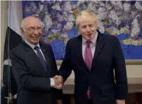  ?? AP ?? Foreign Affairs Adviser Sartaj Aziz shakes hands with British Secretary of State for Foreign Affairs, Boris Johnson, prior to their meeting in Islamabad on Thursday. —