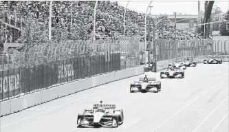  ?? FRANK GUNN THE CANADIAN PRESS ?? Josef Newgarden leads the field early in the Honda Toronto Indy on Sunday.