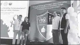  ??  ?? Valenzuela City health office head Dr. Jaime Exconde Jr., Malinta Elementary General PTA vice president Joy Alejandrin­o, School Governance Operations Division head Baltazar Gayem, and DOHMMCHD senior health program officer Ramon Ferrer Jr. represent the four pillars of the Health Shield or ‘Kalasag ng Kalusugan.’