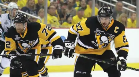  ?? BRUCE BENNETT/GETTY IMAGES FILE PHOTO ?? The Leafs will have their work cut for them against Sidney Crosby, right. “He might be at the highest level he’s ever been at,” coach Mike Babcock said.