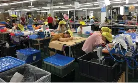  ?? Photograph: China Labor Watch ?? The Wah Tung factory in Heyuan, where staff said they worked 175 hours of overtime in onemonth.