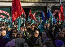  ?? PAULO NUNES DOS SANTOS/NEW YORK TIMES ?? Members of trade unions participat­ed in a solidarity against racism protest on O’Connell Street in Dublin on Nov. 27.