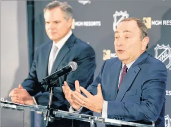  ?? AP PHOTO ?? National Hockey League commission­er Gary Bettman, right, speaks while James Murren, CEO of MGM Resorts Internatio­nal, listens during a news conference in New York Monday.