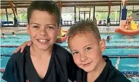  ??  ?? Dylan, right, with older brother Quentin, 10, who is also competing in the Banana Boat OceanKids 200m event.