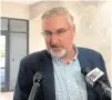  ?? TOM DAVIES/AP ?? Indiana Gov. Eric Holcomb is willing to consider the possibilit­y of cutting taxes.