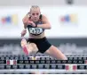  ?? PHANDO JIKELO African News Agency (ANA) ?? Marioné Fourie flies over the hurdles on her way to victory. |