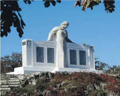  ??  ?? The war memorial stands near the entrance to the 30-hectare Uplands Park. The central figure is Mother Peace, looking down with her arms protecting the 97 names of Oak Bay people killed in the 1939-1945 war.