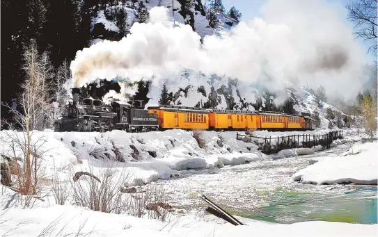  ?? COURTESY OF DURANGO AREA TOURISM OFFICE ?? Durango and Silverton Narrow Gauge Train winds through the mountains and into breathtaki­ng beauty.