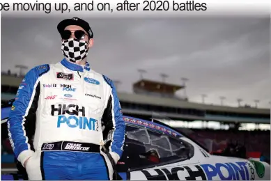  ?? Jared C. Tilton / Getty Images /TNS ?? Driver Chase Briscoe waits on the grid prior to the NASCAR Xfinity Series Desert Diamond Casino West Valley 200 at Phoenix Raceway on Nov. 7, 2020, in Avondale, Arizona.