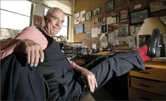  ?? Arkansas Democrat-Gazette/TOMMY METTHE ?? Robert “Red Hawk” Moore sits in his office at the University of Arkansas at Monticello.