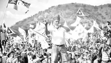  ?? — AFP photo ?? Gusmao delivering his speech during a last day campaign in Dili.