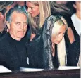  ??  ?? Grief: Donatella and brother Santo at the memorial mass for Gianni