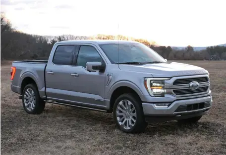  ?? MARC GRASSO PHOTOS / BOSTON HERALD ?? BUILT FORD TOUGH: The Ford F-150 Hybrid came with a surprising­ly smooth, powerful package and as always impressed with the latest gear including a handy generator, see the plugs to the left, and comfortabl­e seats.