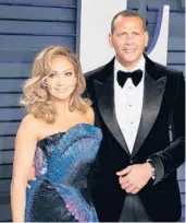  ?? JEAN-BAPTISTE LACROIX/GETTY-AFP ?? Jennifer Lopez and Alex Rodriguez attend the 2019 Vanity Fair Oscar party.