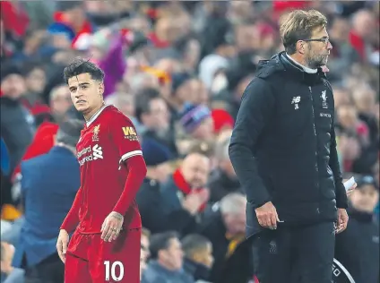  ?? FOTO: GETTY IMAGES ?? Philippe Coutinho y Jürgen Klopp, el 30 de diciembre ante el Leicester después del último partido del brasileño hasta ahora