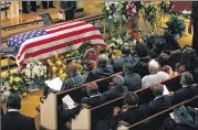  ?? GERRY MELENDEZ / THE STATE ?? People attend a service for the Rev. Daniel Simmons Sr. at Bethel AME church in Columbia, S.C., on Thursday. Simmons was killed in the June 17 shootings.