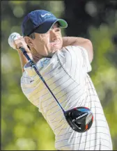  ?? The Associated Press ?? Stephen B. Morton
Rory Mcilroy follows through on a drive from the 12th tee Saturday during the CJ Cup’s third round at Congaree Golf Club.