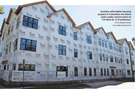  ?? KYLE ROBERTSON/ COLUMBUS DISPATCH ?? Another affordable housing project in Columbus are these units under constructi­on at 731 Rich St. in Franklinto­n.