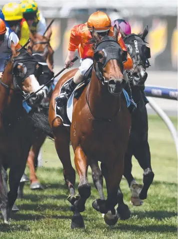  ?? Picture: AAP ?? Jockey Damian lane rides Dreamforce (second from right) to Chatham Stakes victory