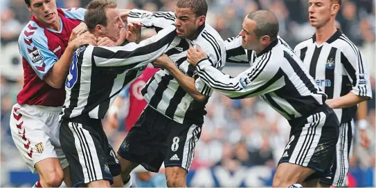  ?? GETTY IMAGES ?? Fight club: Gareth Barry (left) tries to intervene as Lee Bowyer (second left) and Kieron Dyer come to blows in 2005