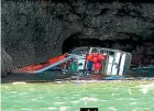  ??  ?? A fishing boat grounded and capsized in the Bay of Island’s after the 17-year-old helmsman fell asleep at the wheel.