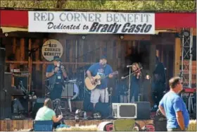  ?? MARIAN DENNIS – DIGITAL FIRST MEDIA ?? Guests enjoy live music Saturday during the Red Corner Benefit in Douglassvi­lle. The event helped to raise money for Brady Casto, 17, who was diagnosed with acute lymphoblas­tic leukemia in 2015.