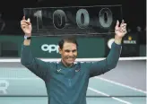  ?? Jean Catuffe / Getty Images ?? Rafael Nadal of Spain celebrates his 1,000th match victory at the Paris Masters. Nadal’s first win came in May 2002 at the age of 15.