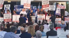  ?? (Twitter) ?? IBC WORKERS protest Zionist Union MK Merav Michaeli’s speech at a Histadrut labor federation event yesterday in Tel Aviv.
