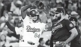  ?? Wally Skalij Los Angeles ?? DODGERS outfielder Andy Pages exults after his first major league hit on Tuesday. He said his mom watched his debut in Cuba and that “obviously she did cry.”