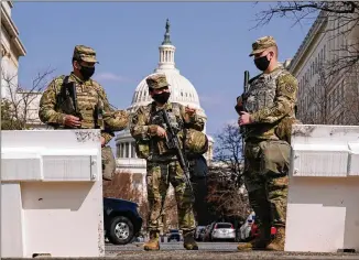  ?? CAROLYN KASTER/AP ?? There are currently 5,200 members of the National Guard activated to bolster security around the U.S. Capitol after the Jan. 6 storming of the building by rioters who supported Donald Trump.