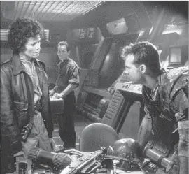  ?? Stanley Bielecki Movie Collection / Getty Images ?? BILL PAXTON squares off with Sigourney Weaver in “Aliens,” the film in which Paxton’s character, Pvt. William Hudson, delivers the line: “It’s game over, man.”