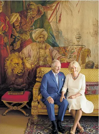  ??  ?? TENDER MOMENT: Camilla places her hand on Prince Charles’ thigh in the photograph taken in Clarence House’s Garden Room