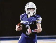  ?? Pete Paguaga / Hearst Connecticu­t ?? Andrew Swierbut plays an important role for Newtown on offense, defense and special teams.