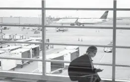  ?? PATRICK SEMANSKY/AP ?? A Delta aircraft moves away from a gate May 25 in Arlington, Virginia.