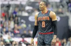  ?? ROB CARR/GETTY IMAGES ?? After only one season, the Atlanta Hawks traded exOrlando Magic center Dwight Howard to the Charlotte Hornets. Howard is on his fourth team since he left the Magic in 2012.