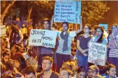  ?? — PTI ?? JNU students at a protest over the issue of compulsory attendance in New Delhi recently.