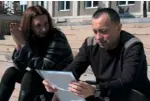  ??  ?? Top: A survivor from the deadly fire. Above: Catalin Tolontan (right) and a colleague from Gazeta Sporturilo­r.