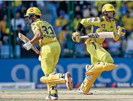 ?? ?? Devon Conway (R) and Ruturaj Gaikwad of Chennai Super Kings run between the wickets during their match against Delhi Capitals on Saturday (AFP)
